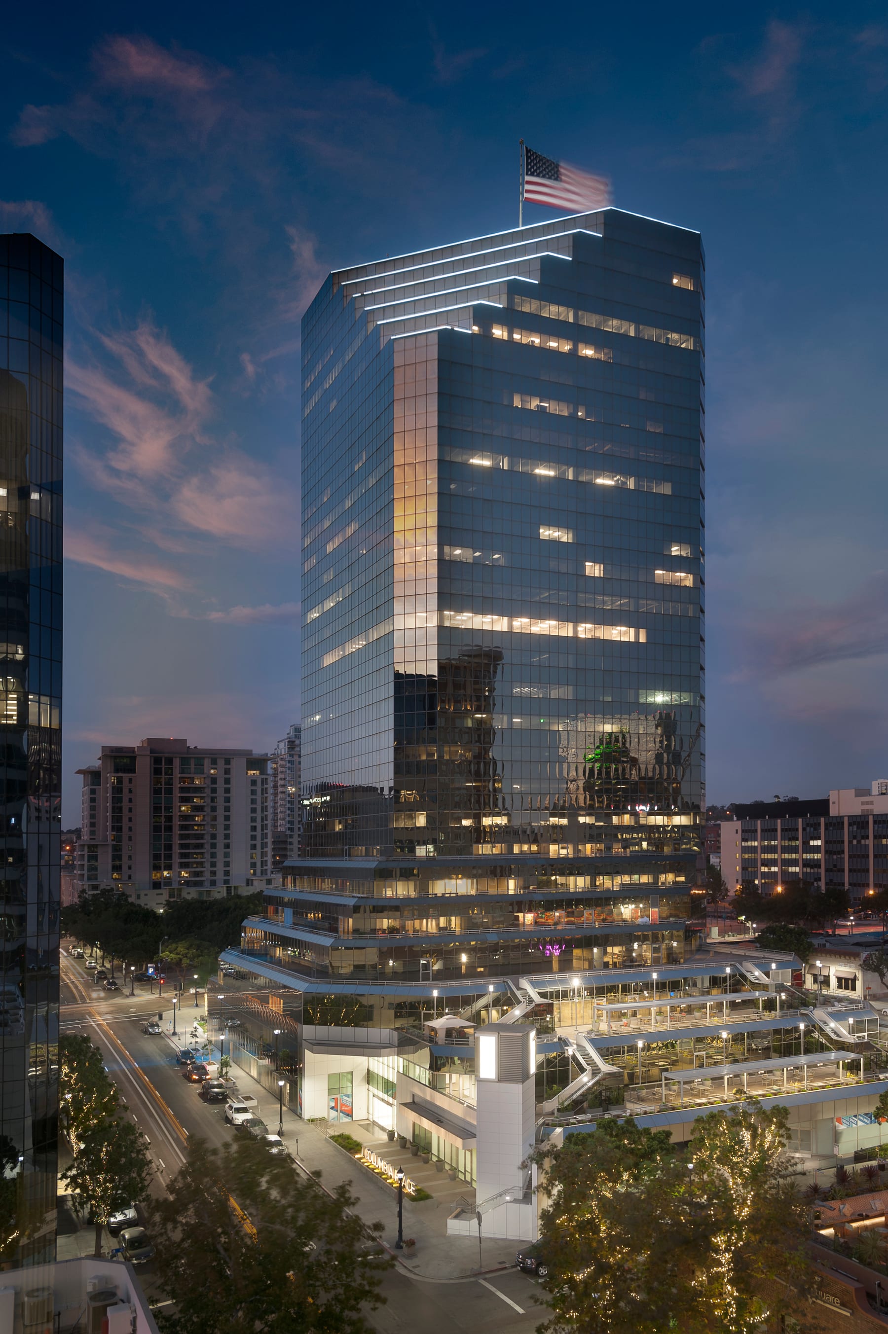 One Columbia Place illuminated at dusk